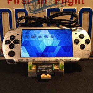 Sony PSP 2000 with Charger, Memory Stick, & Games